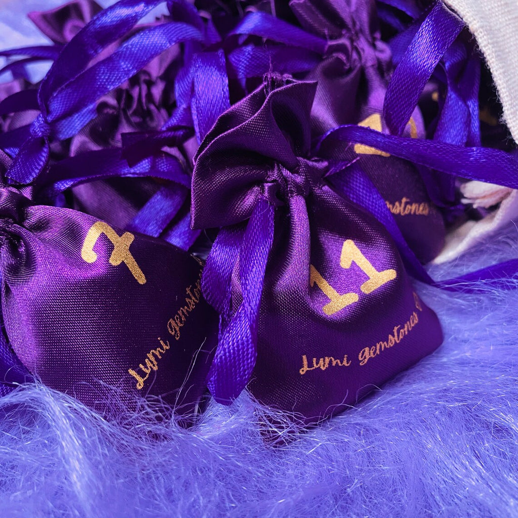 Small purple bags with numbers for each day